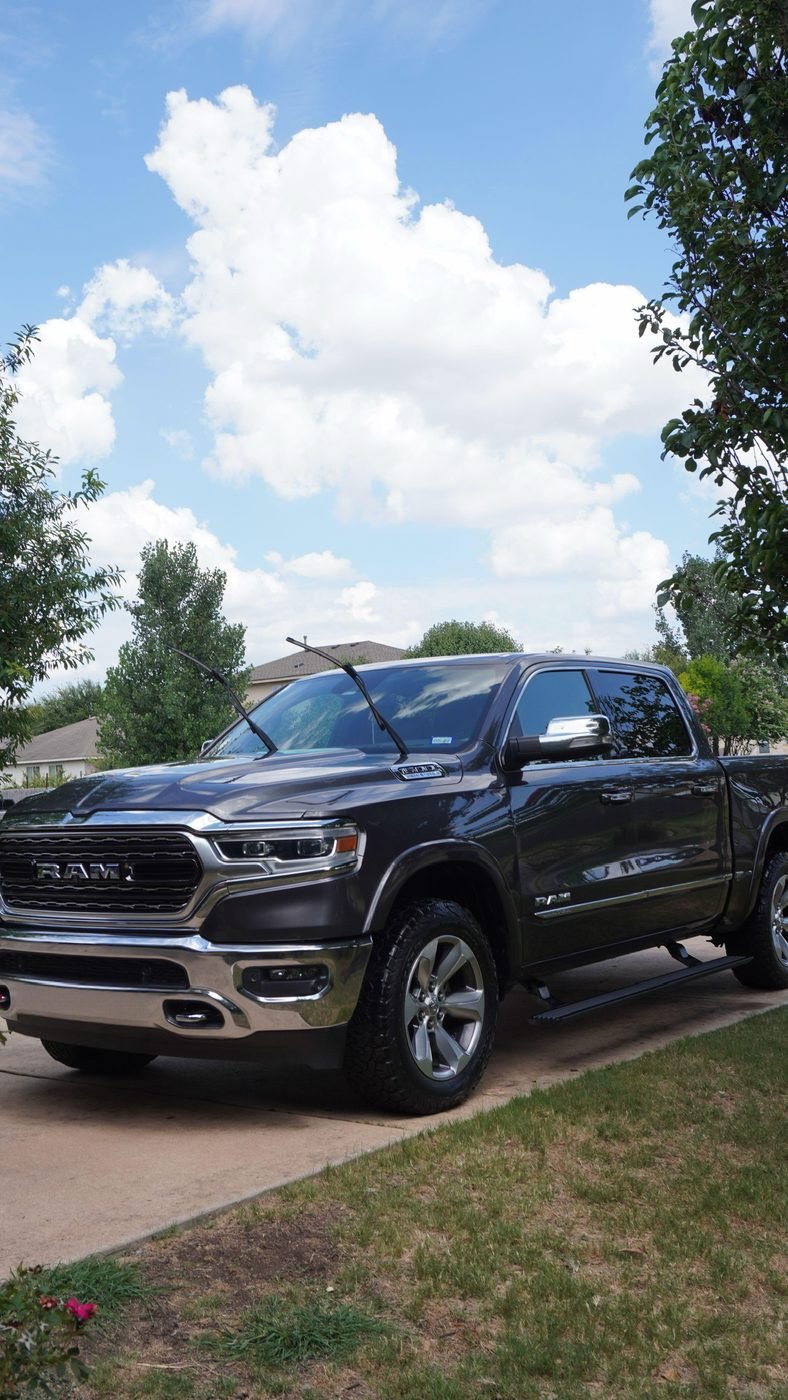 RAM 1500 Limited exterior detail with polished paint and dressed tires