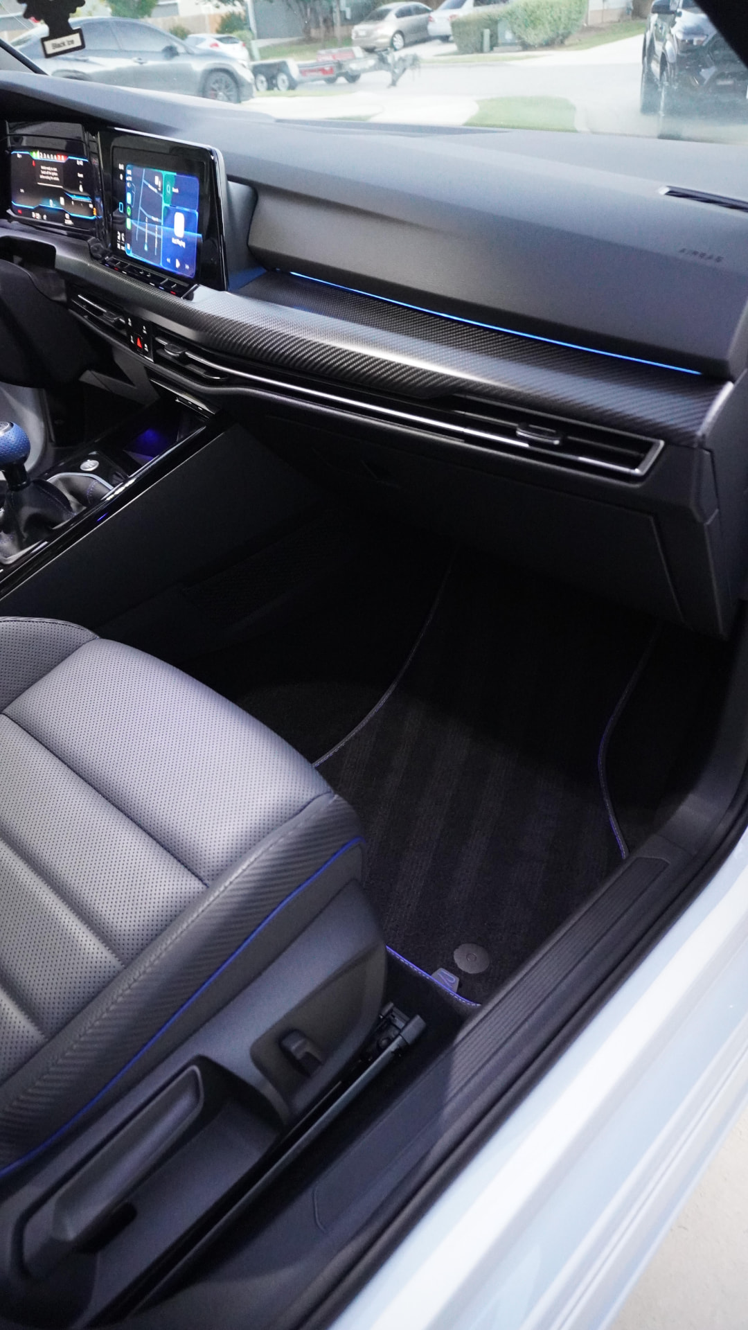 Immaculate grey leather and carbon-fiber interior after interior detailing